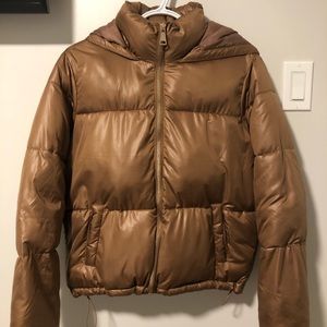 brown and gold puffer jacket.